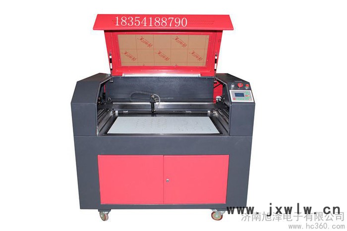 供應(yīng)旭澤xz-6090樹脂工藝標(biāo)牌激光雕刻機(jī)