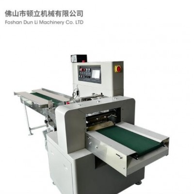 麻辣燙套袋包裝設備非油炸面餅自動進袋機450X速度快包裝廠家訂制